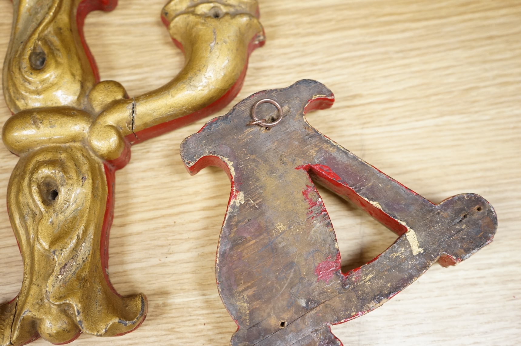 A quantity of decorative carved, painted and gilt carnival letters, each approximately 23cm high